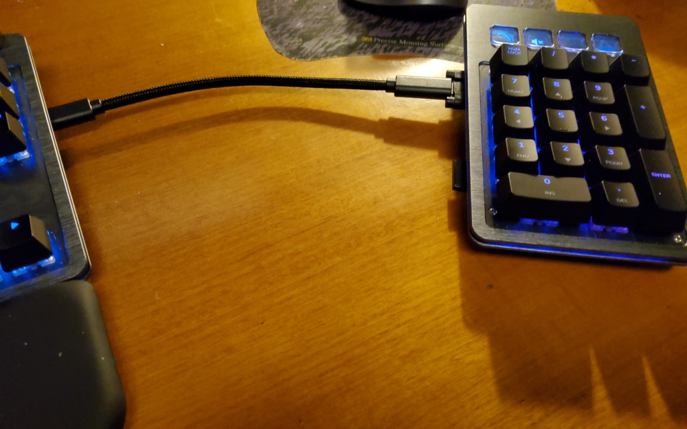 the unwieldy cable included in the Max configuration to connect the keypad with some distance to the main keyboard
